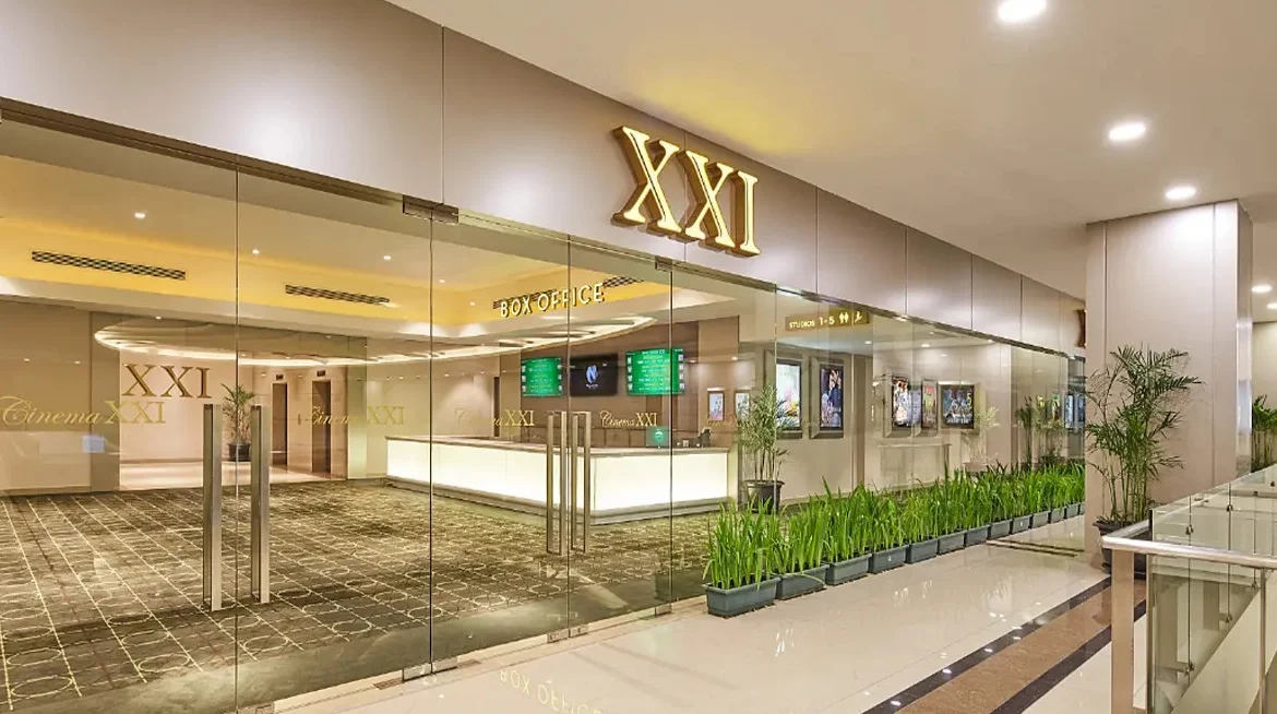 XXI